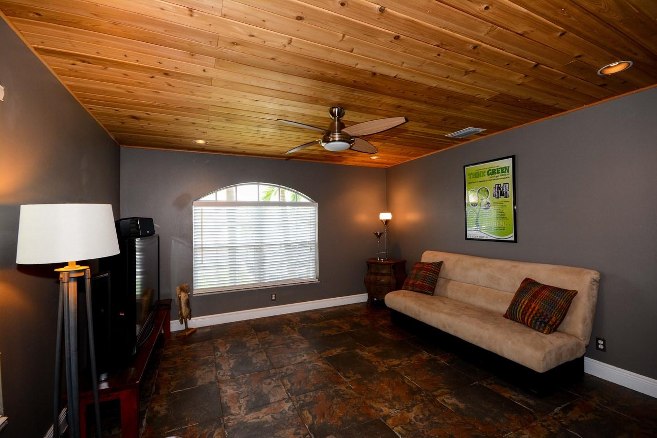 6896 Long Key Street Lake Worth, FL 33467 - Photo 6 of 18 a view of workspace with furniture and window