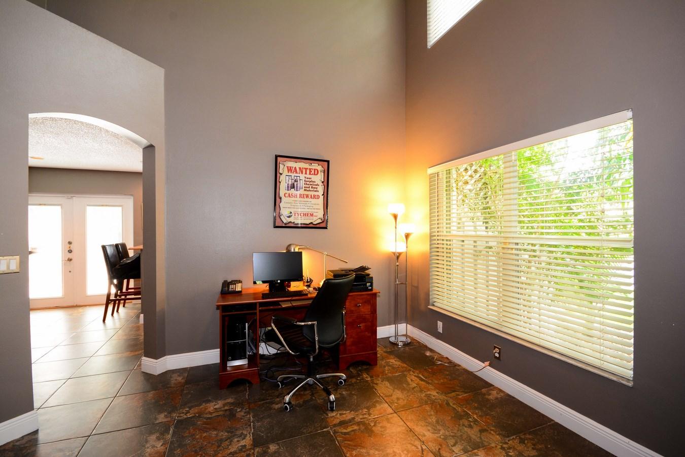 6896 Long Key Street Lake Worth, FL 33467 - Photo 7 of 18 a workspace with furniture and a window