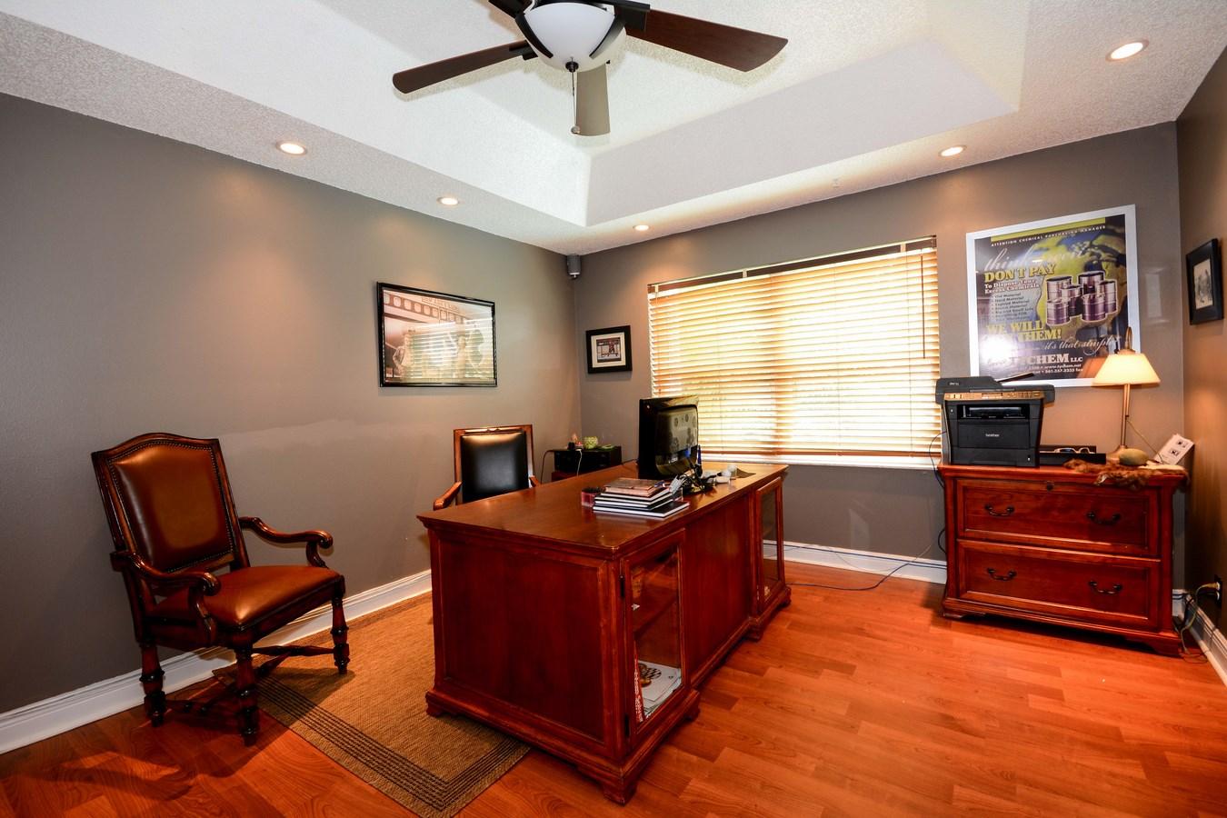 6896 Long Key Street Lake Worth, FL 33467 - Photo 9 of 18 a living room with furniture and a large window