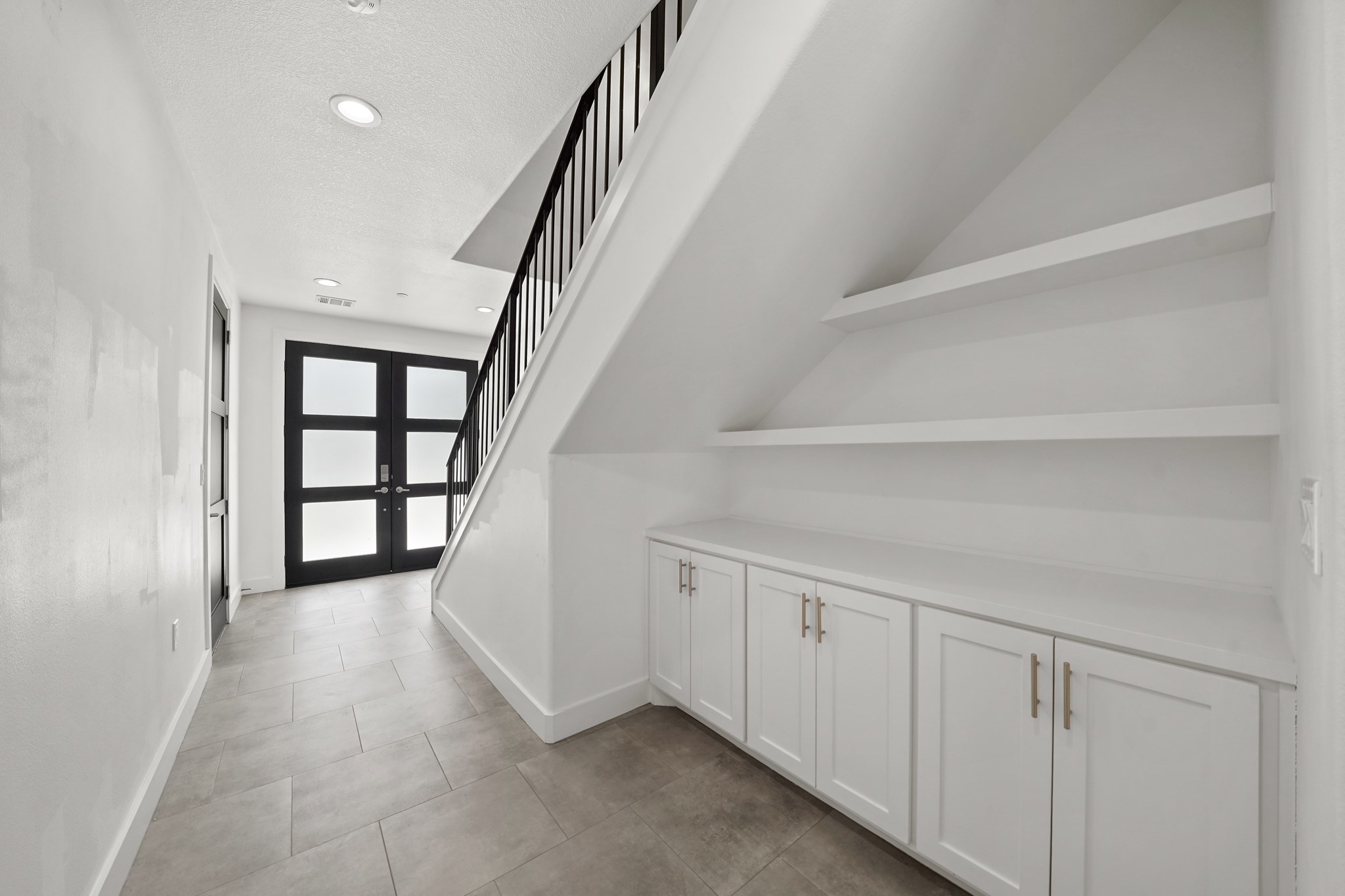 5345 Larkin Street Houston, TX 77007 - Photo 4 of 21 Gorgeous entry and stairs up to living and bedrooms