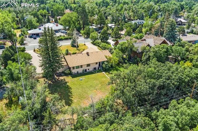 a view of a house with a swimming pool