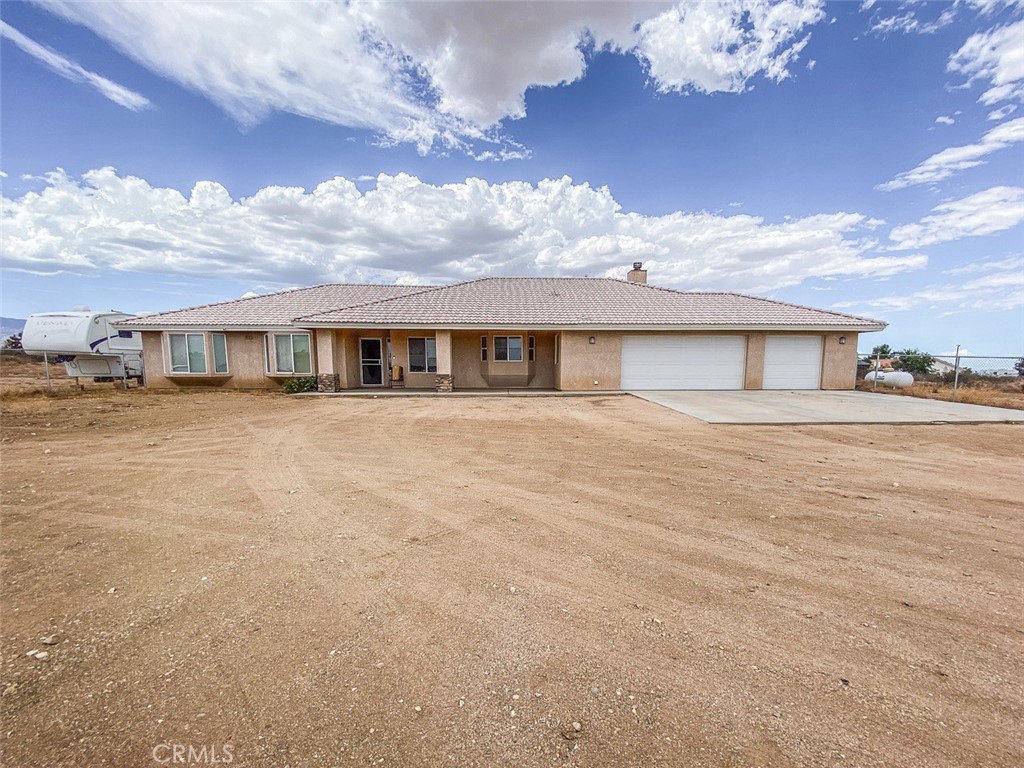 11420 Oxford Road Phelan, CA 92371 - Photo 1 of 1 front view of a house with a yard