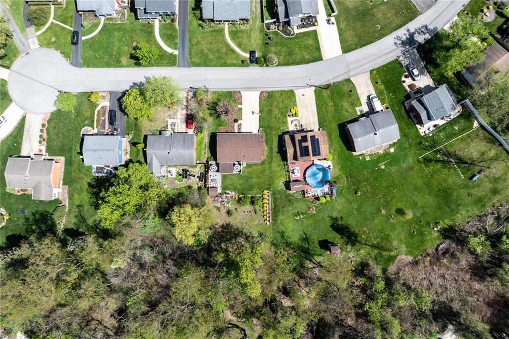2955 Kings Mill Road Bethel Park, PA 15102 - Photo 32 of 40 an aerial view of a house with a yard potted plants and large tree