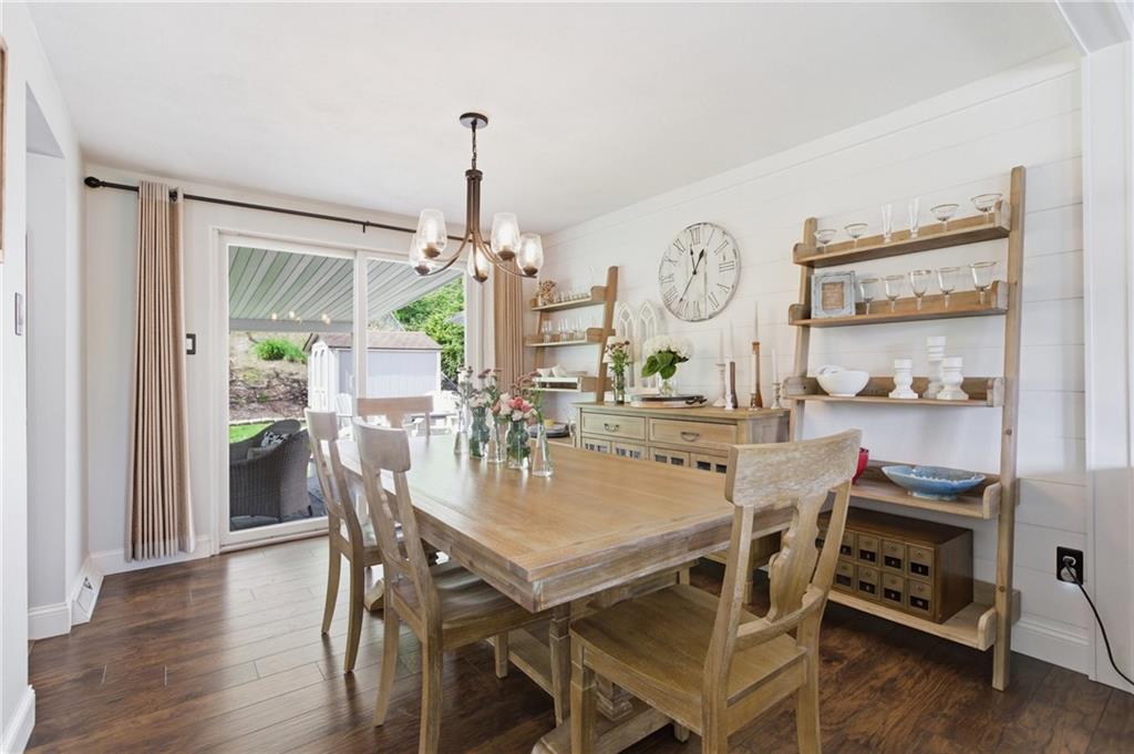 2955 Kings Mill Road Bethel Park, PA 15102 - Photo 6 of 40 a view of a dining room with furniture window and wooden floor