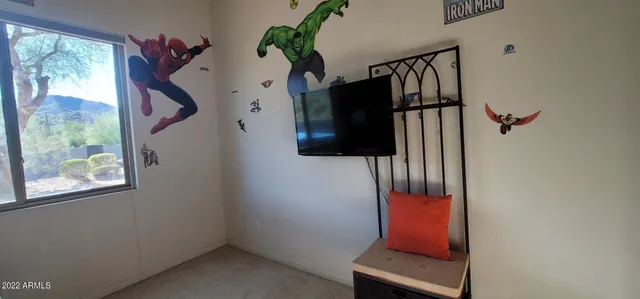 a bathroom with a sink and a washer dryer