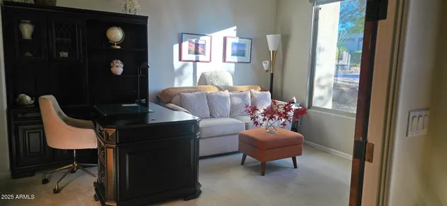 a kitchen with granite countertop a refrigerator a stove and a sink