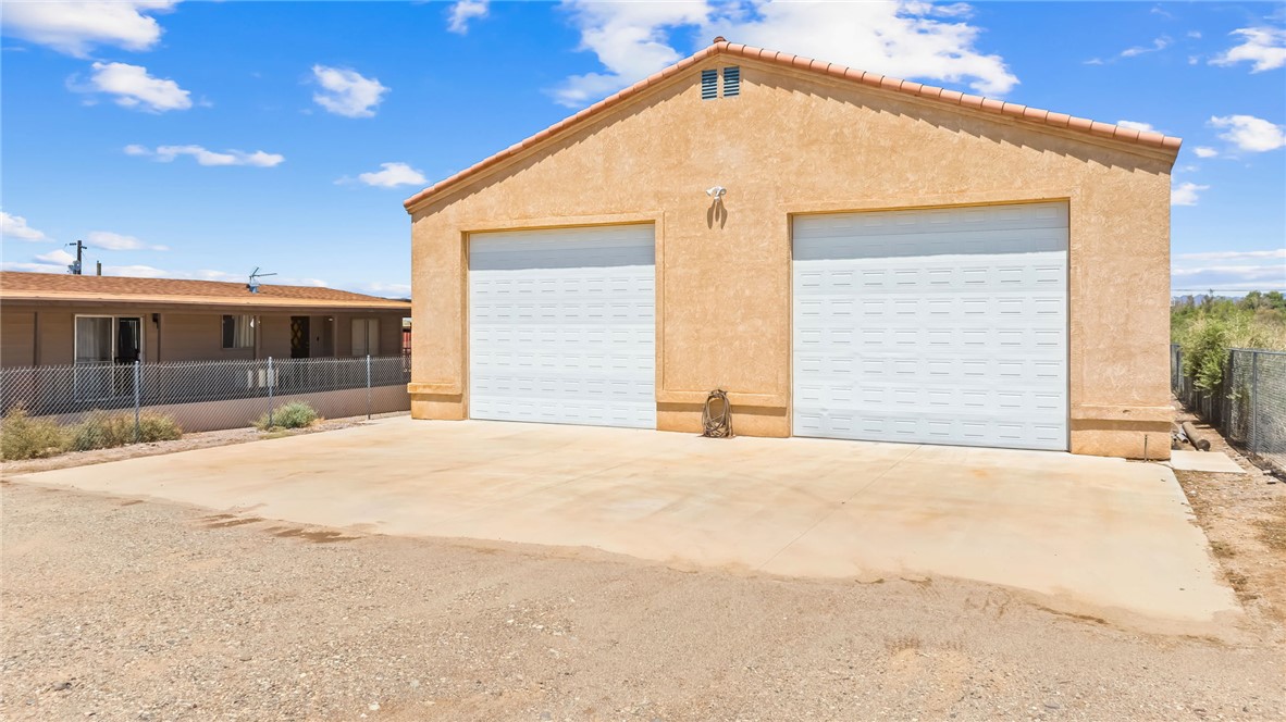1084 Dike Road Mohave Valley, AZ 86440 - Photo 70 of 75 a view of a house with a outdoor space