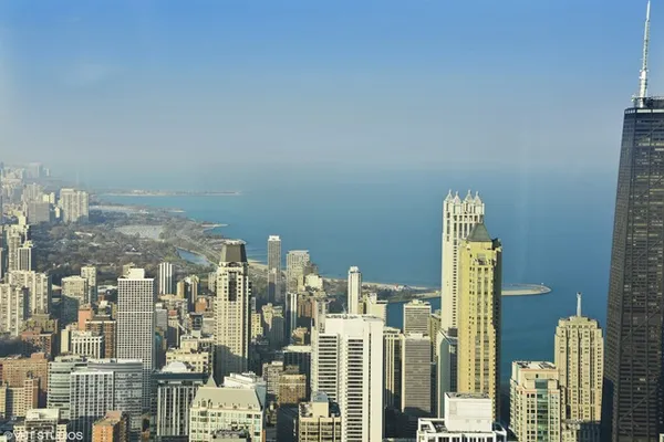 a view of a city with tall buildings