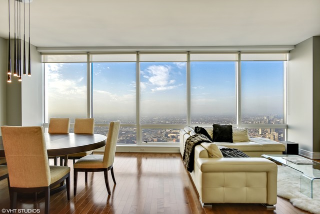 401 North Wabash Avenue, Unit 80B Chicago, IL 60611 - Photo 5 of 34 a dining room with furniture and a large window