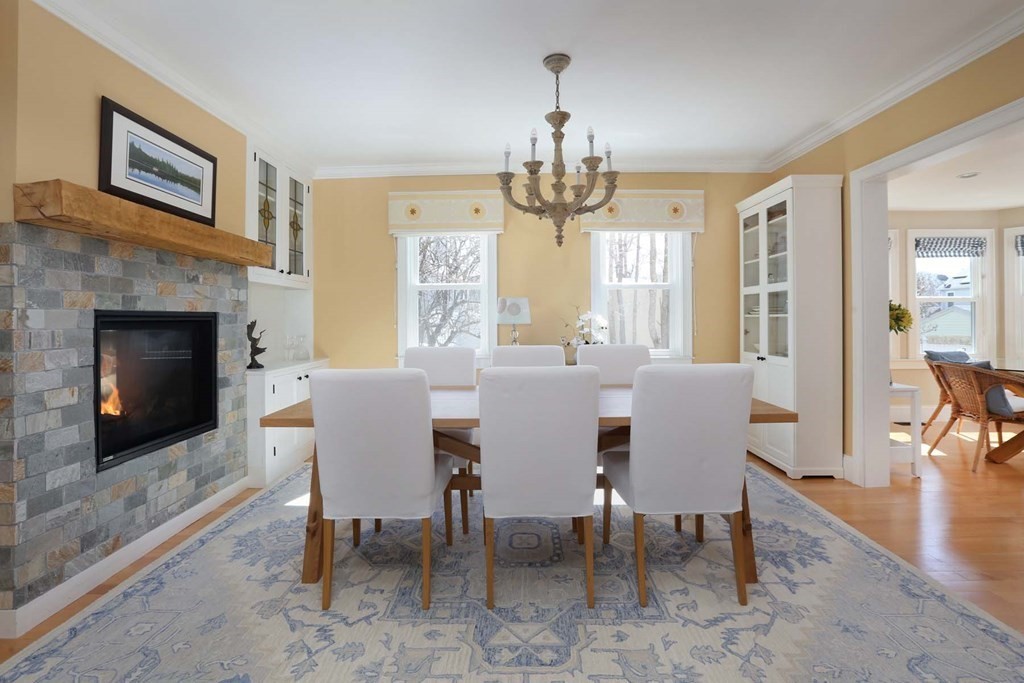 491 Webster Street Needham, MA 02494 - Photo 11 of 37 a view of a dining room with furniture window and wooden floor