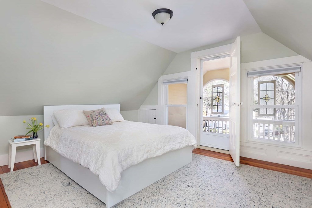 491 Webster Street Needham, MA 02494 - Photo 21 of 37 a bedroom with a bed and a window