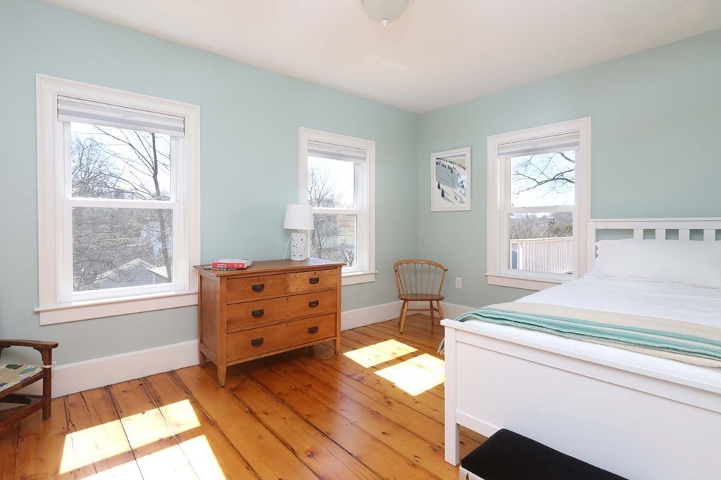 491 Webster Street Needham, MA 02494 - Photo 22 of 37 a bedroom with a bed and a window