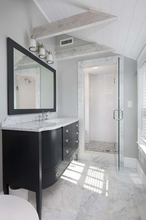 491 Webster Street Needham, MA 02494 - Photo 26 of 37 a bathroom with a double vanity sink mirror and shower