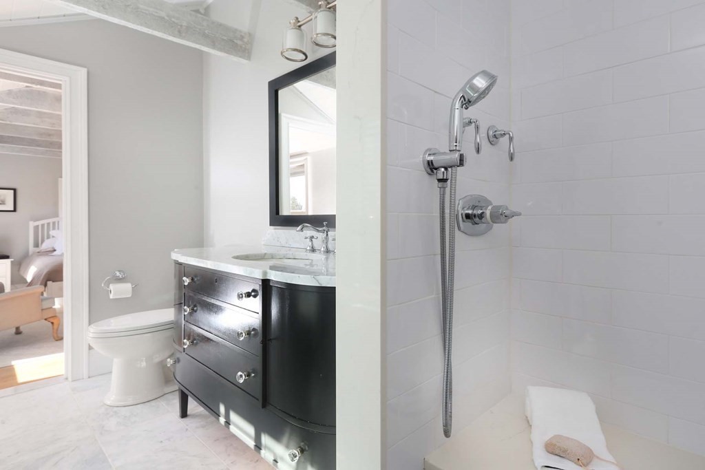 491 Webster Street Needham, MA 02494 - Photo 27 of 37 a bathroom with a sink toilet and shower