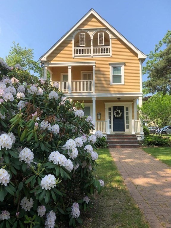 491 Webster Street Needham, MA 02494 - Photo 36 of 37 a front view of a house with a yard