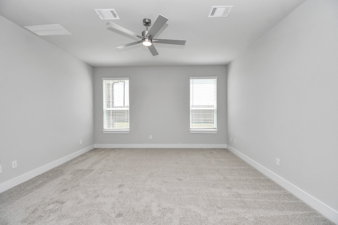 3123 Native Spg Drive Spring, TX 77373 - Photo 22 of 38 Another perspective unveils a comprehensive view of the serenity and comfort this primary suite offers. Sample photo of completed home with similar floor plan. Actual colors and selections may vary.