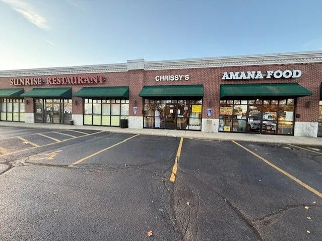 a view of a building with a street
