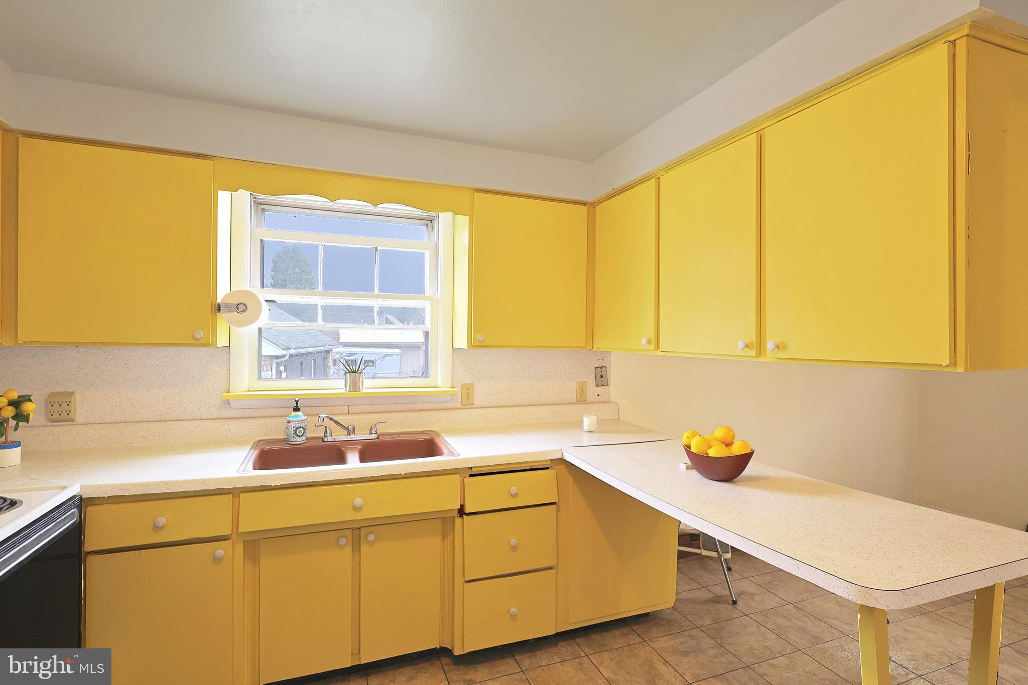 159 Rocket Center Road Keyser, WV 26726 - Photo 20 of 64 a kitchen with a sink and a window