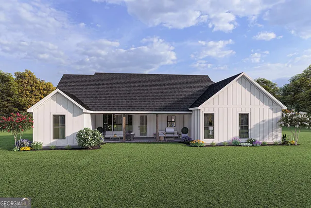 front view of a house with a yard