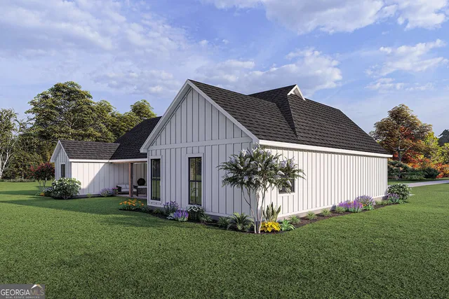 a front view of house with yard and green space