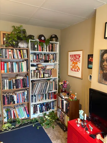 a book shelf with books and book shelf