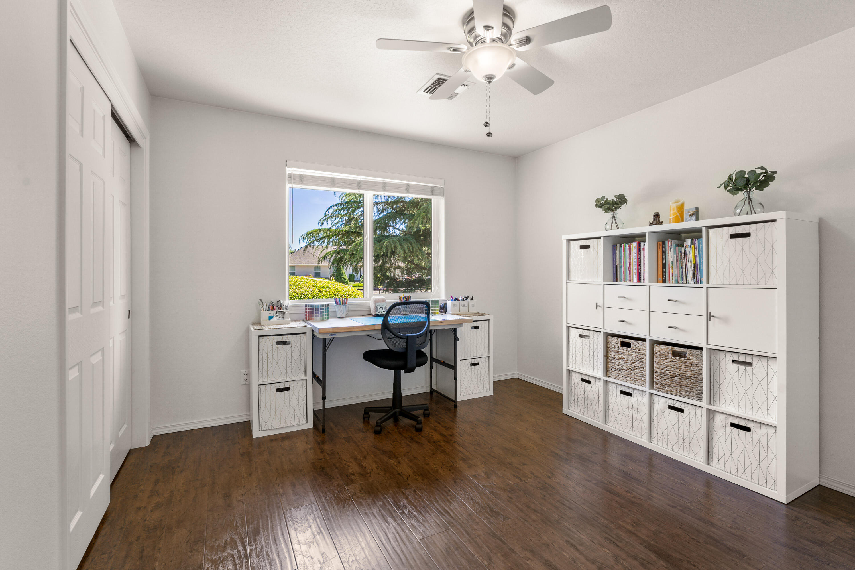 974 Felicia Lane Grants Pass, OR 97527 - Photo 18 of 36 a view of a workspace with furniture and wooden floor