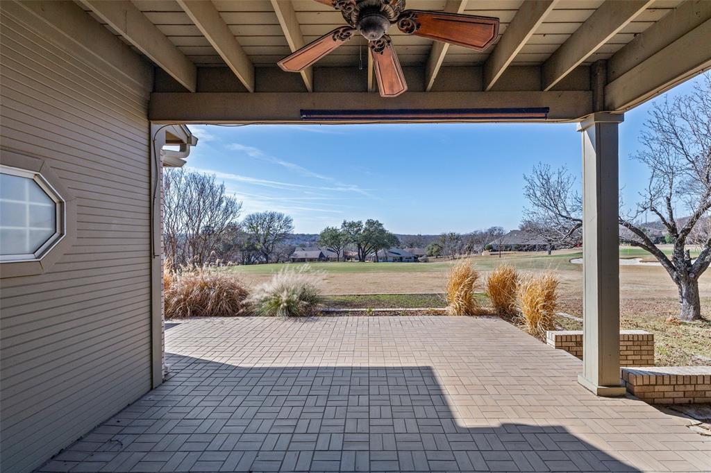 8908 Brierfield Road Granbury, TX 76049 - Photo 32 of 40 a view of a balcony with lake view and a floor to ceiling window