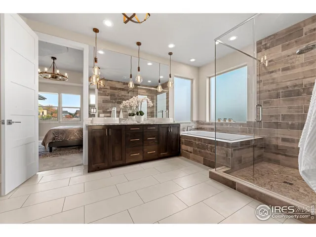 a room with a wooden floor and furniture