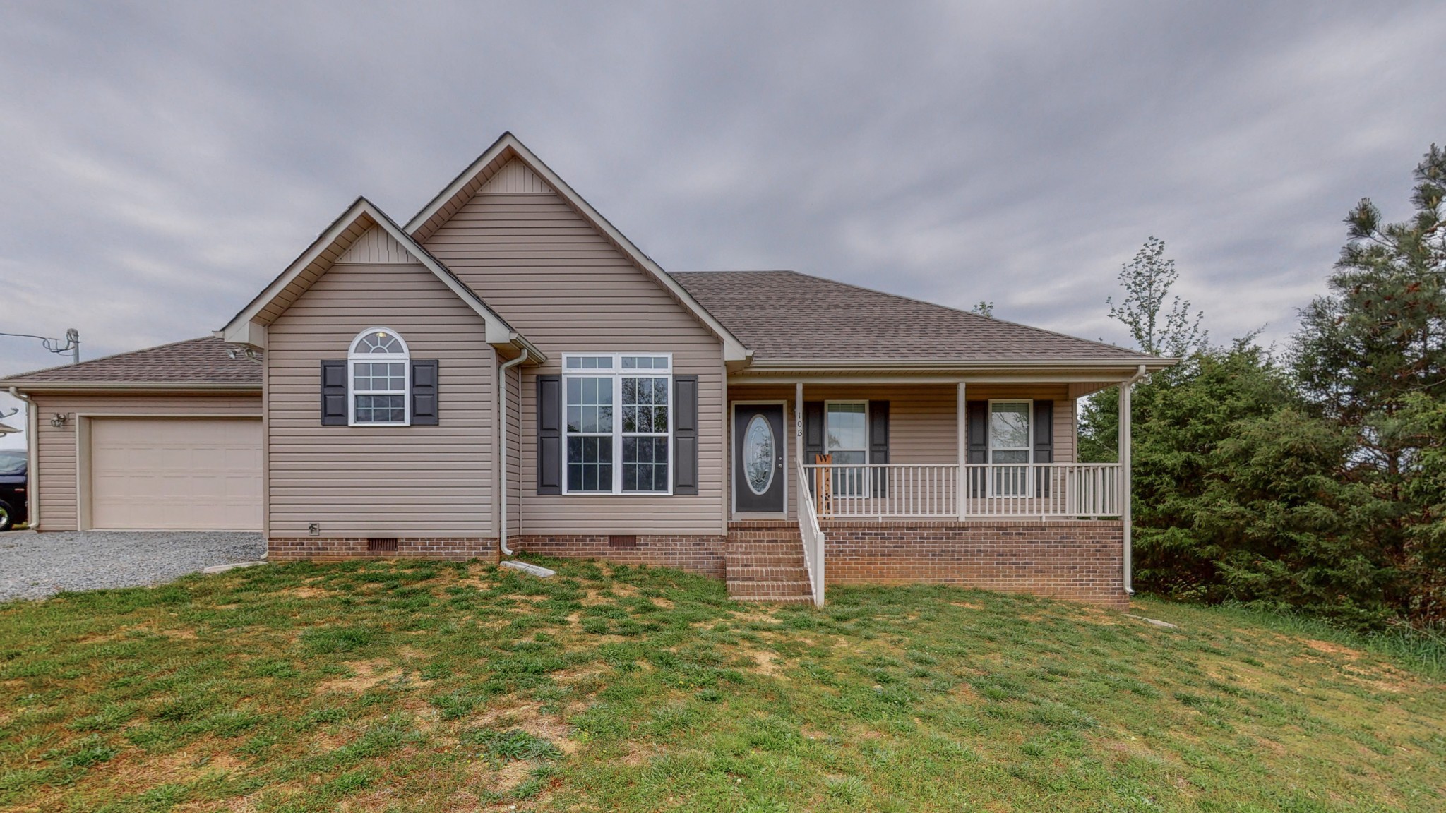 10 South Howard Fitch Road Fayetteville, TN 37334 - Photo 2 of 40 front view of a house with a yard