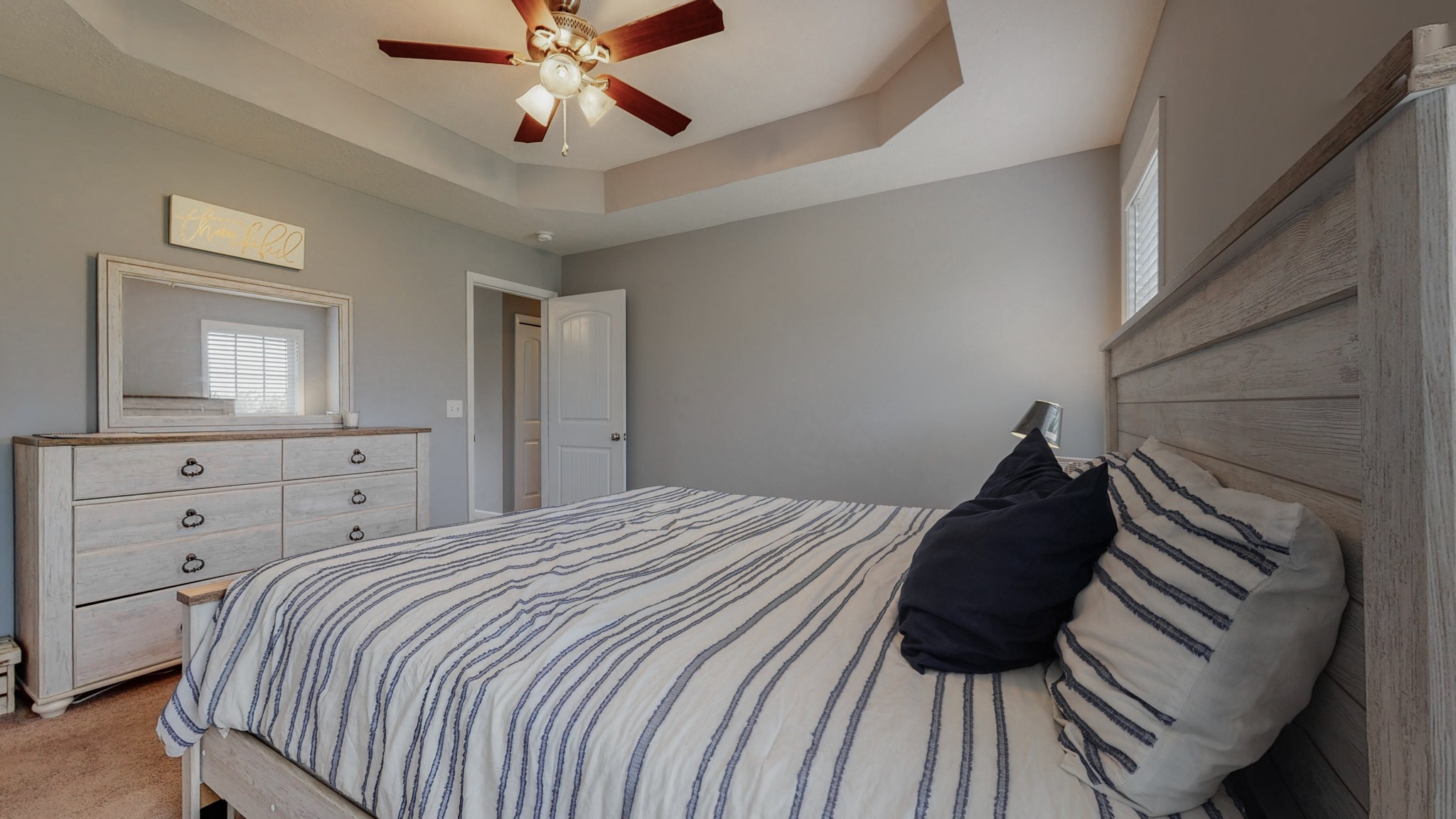 10 South Howard Fitch Road Fayetteville, TN 37334 - Photo 13 of 40 a bedroom with a bed and a ceiling fan