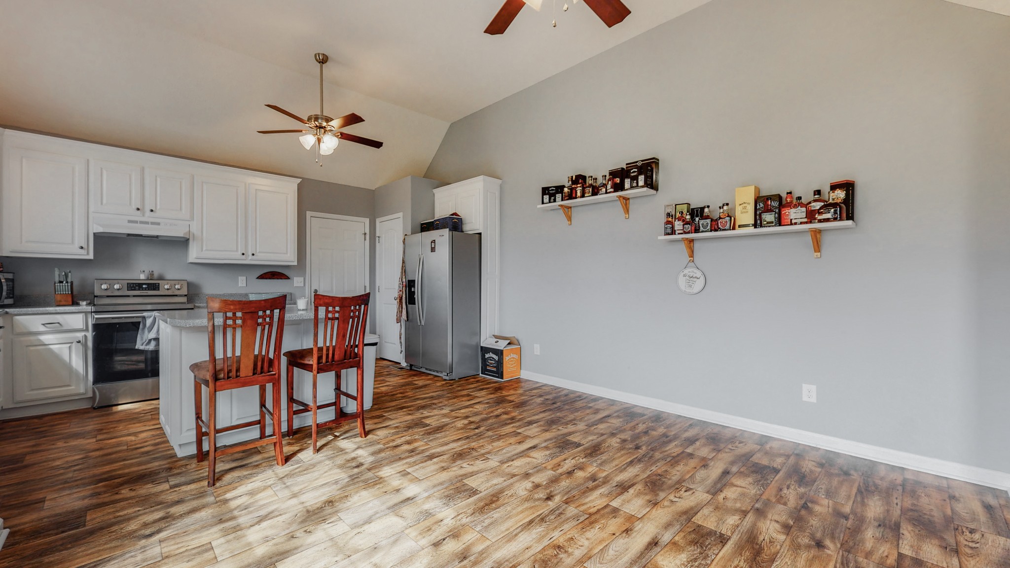 10 South Howard Fitch Road Fayetteville, TN 37334 - Photo 18 of 40 a very nice looking room with a dining table chairs and a refrigerator