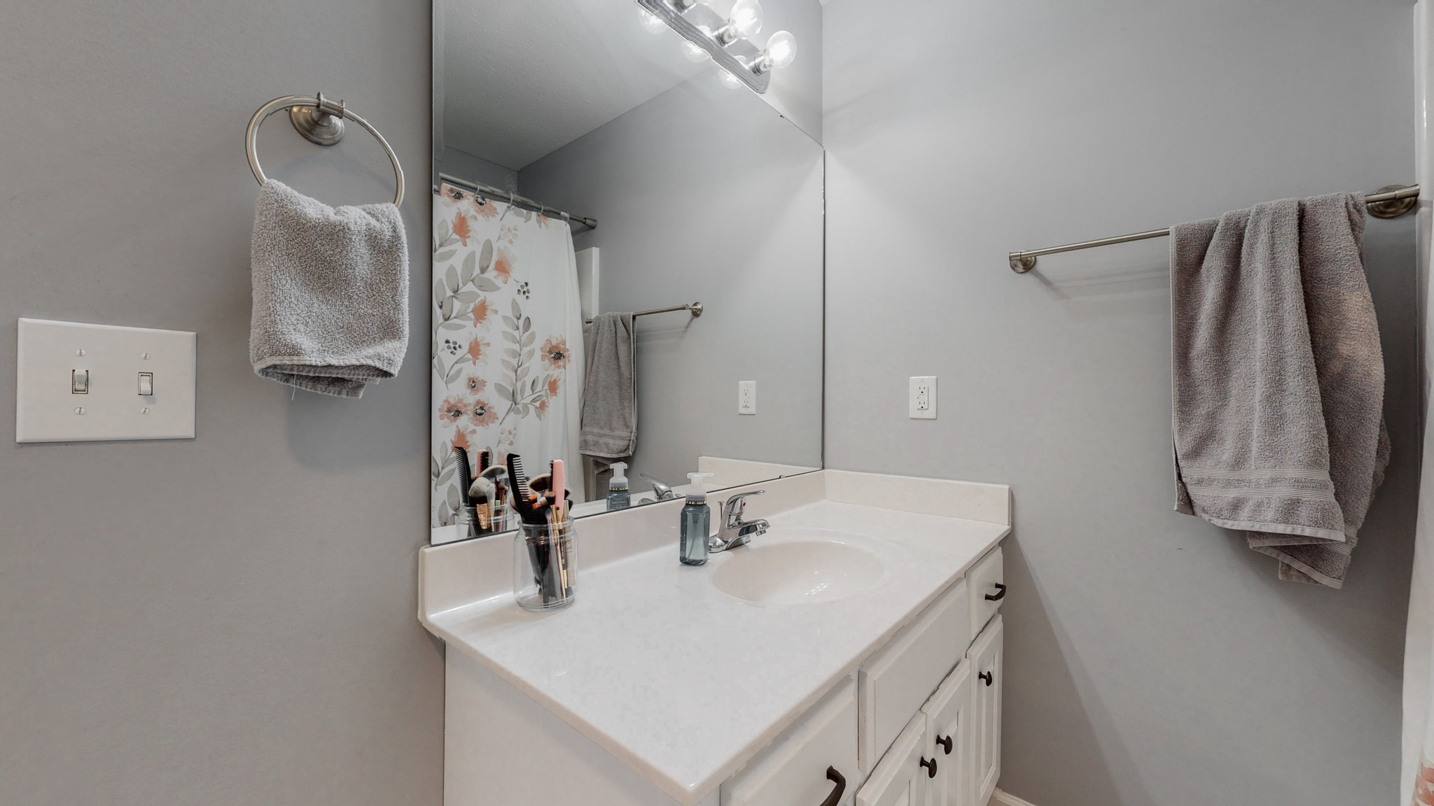 10 South Howard Fitch Road Fayetteville, TN 37334 - Photo 22 of 40 a bathroom with a sink vanity and a mirror
