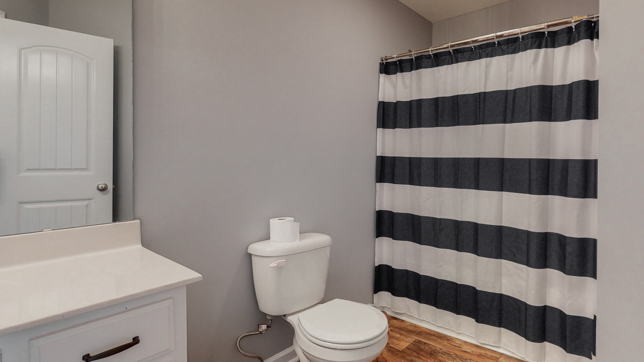 10 South Howard Fitch Road Fayetteville, TN 37334 - Photo 27 of 40 a white toilet and shower curtain