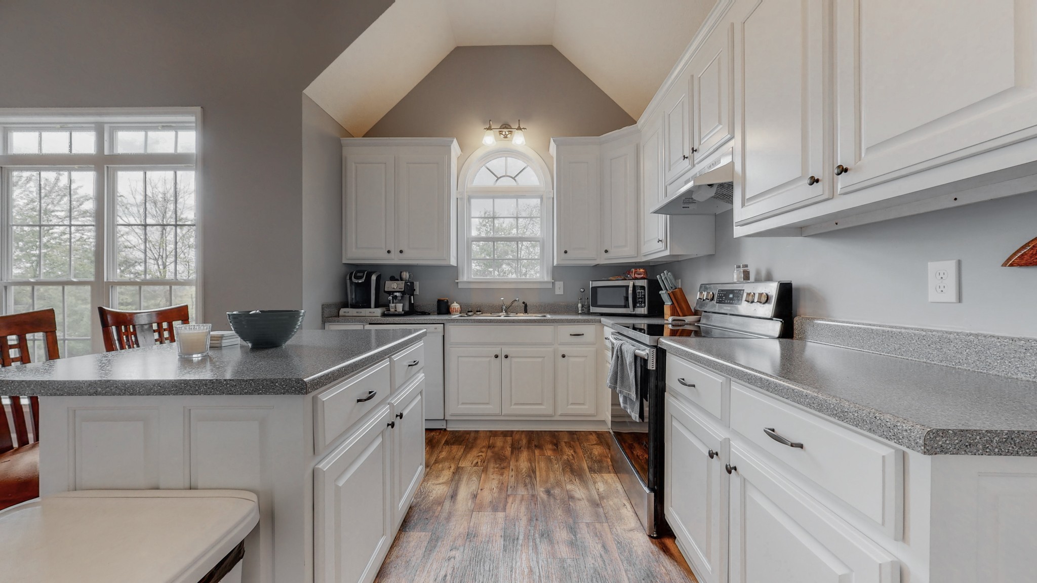 10 South Howard Fitch Road Fayetteville, TN 37334 - Photo 4 of 40 a kitchen with white cabinets appliances and a sink