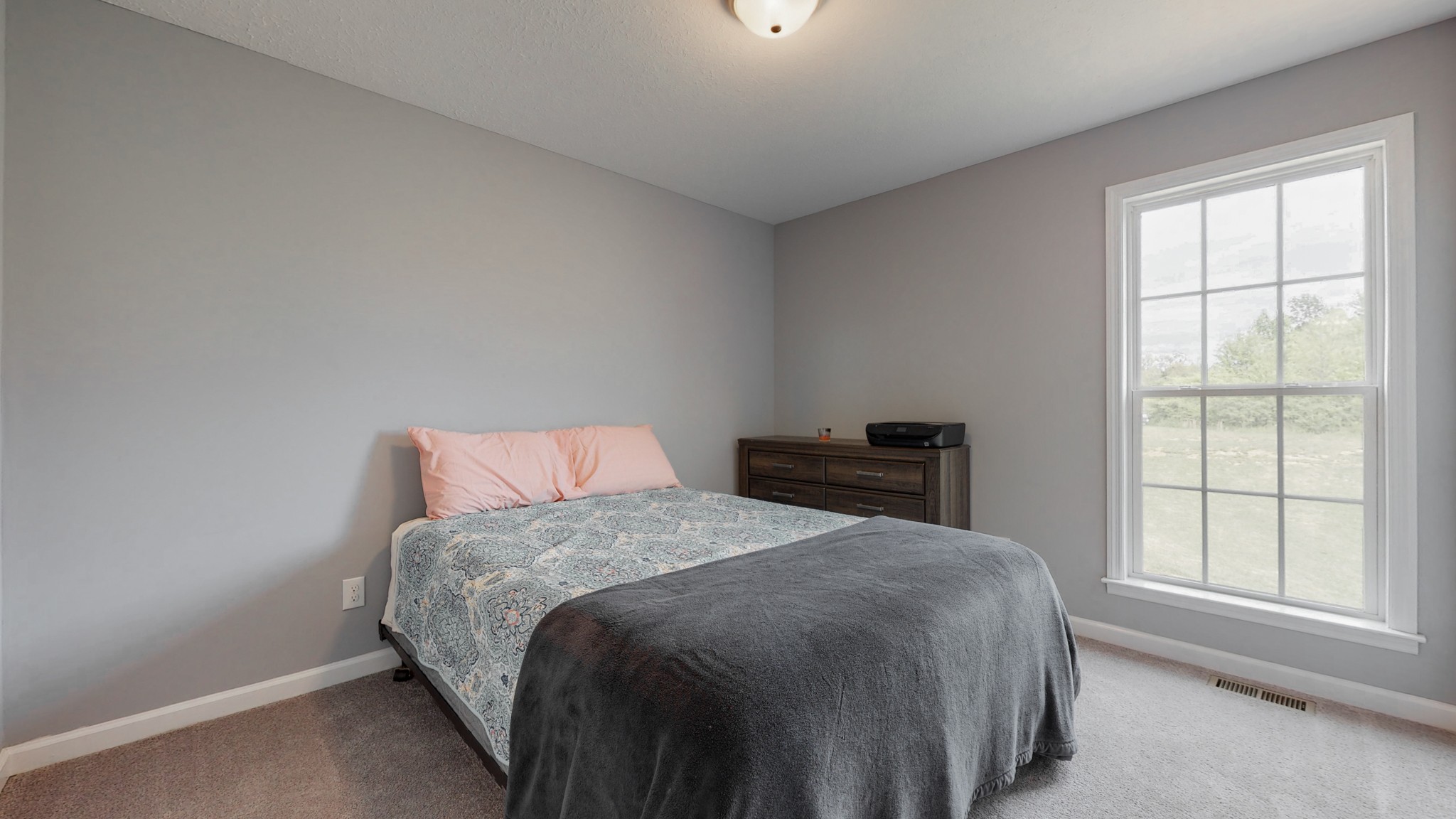 10 South Howard Fitch Road Fayetteville, TN 37334 - Photo 34 of 40 a bed sitting in a bedroom next to a window