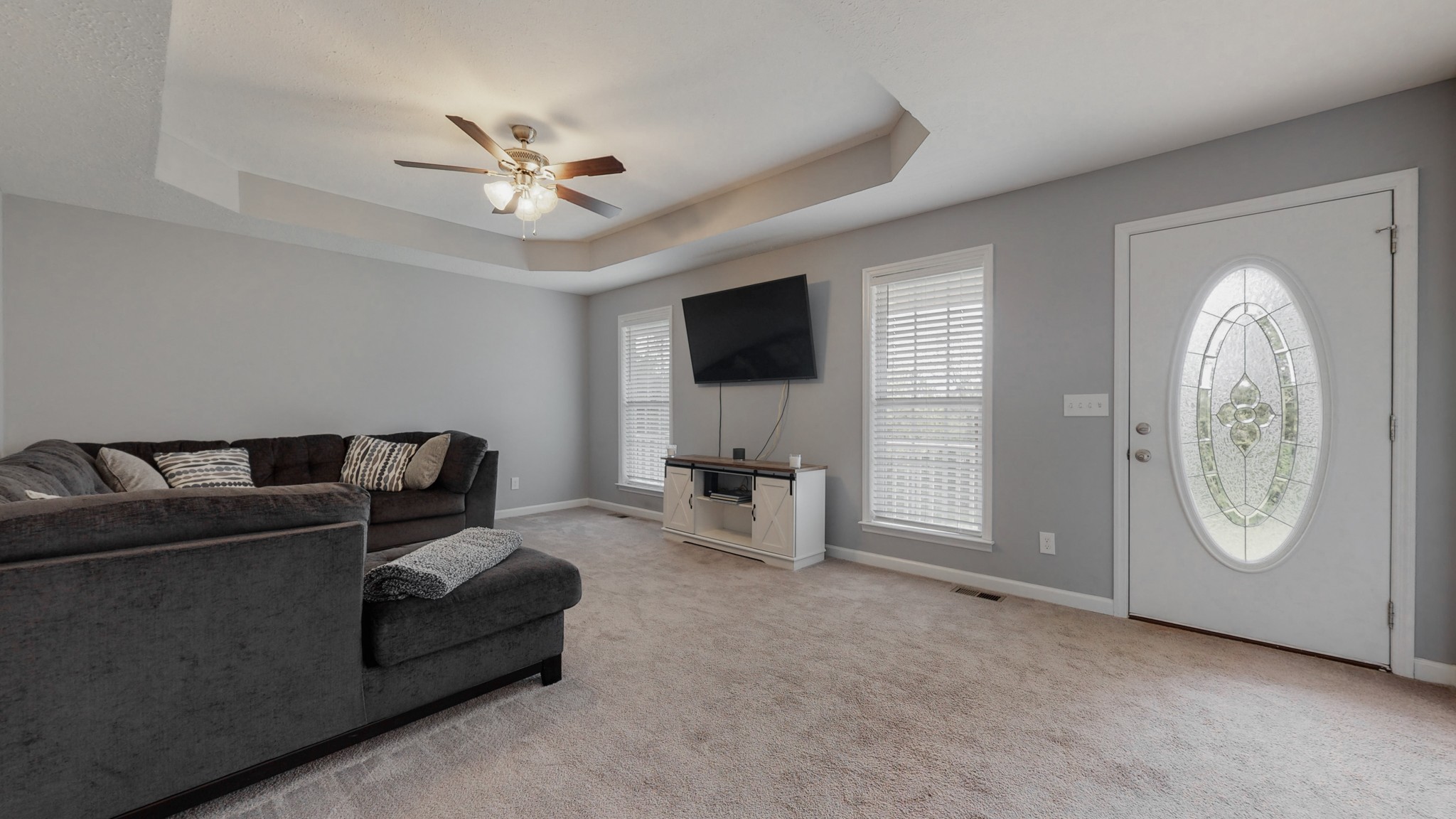 10 South Howard Fitch Road Fayetteville, TN 37334 - Photo 9 of 40 a living room with furniture a flat screen tv and a window