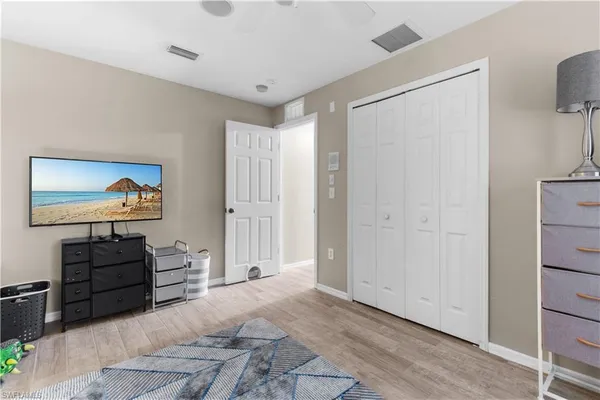 a view of living room with furniture and flat screen tv