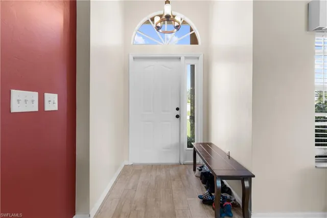 a view of a hallway with workspace