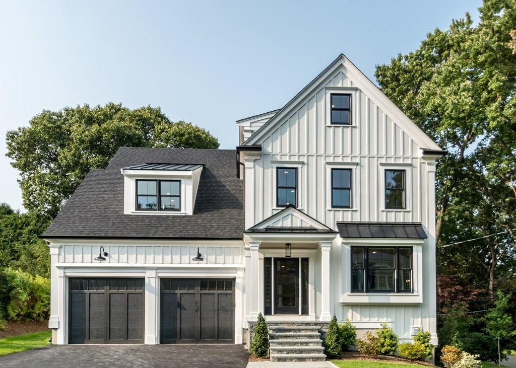 56 Pershing Road Needham, MA 02494 - Photo 1 of 42 a front view of a house with a yard