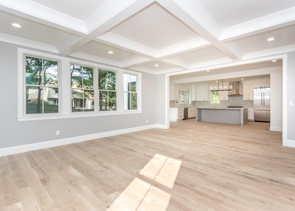 56 Pershing Road Needham, MA 02494 - Photo 15 of 42 a large room with a large window and furniture