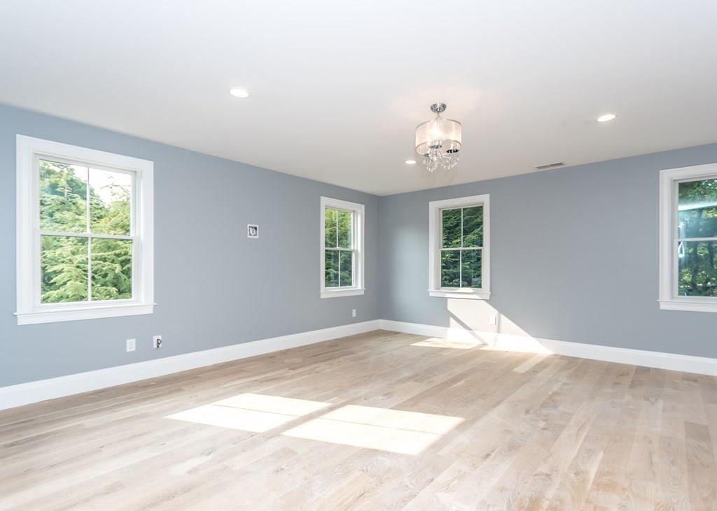 56 Pershing Road Needham, MA 02494 - Photo 19 of 42 a view of an empty room with a window