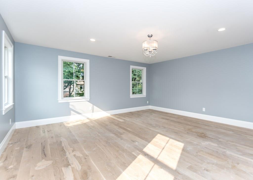 56 Pershing Road Needham, MA 02494 - Photo 20 of 42 a view of an empty room with a window