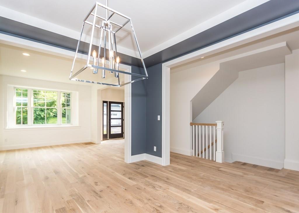 56 Pershing Road Needham, MA 02494 - Photo 6 of 42 a view of a livingroom with a staircase