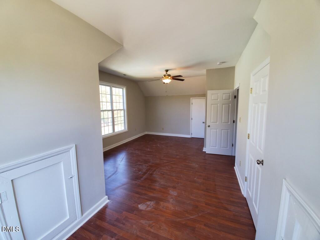 8007 Sundance Circle Durham, NC 27713 - Photo 20 of 23 a view of a room with wooden floor and window