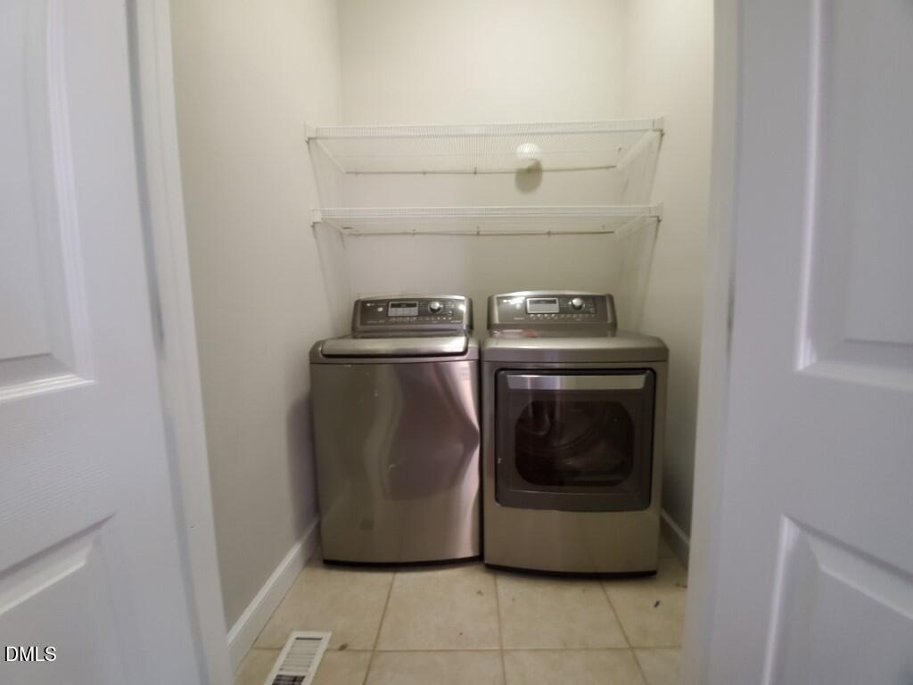 8007 Sundance Circle Durham, NC 27713 - Photo 22 of 23 a utility room with washer and dryer