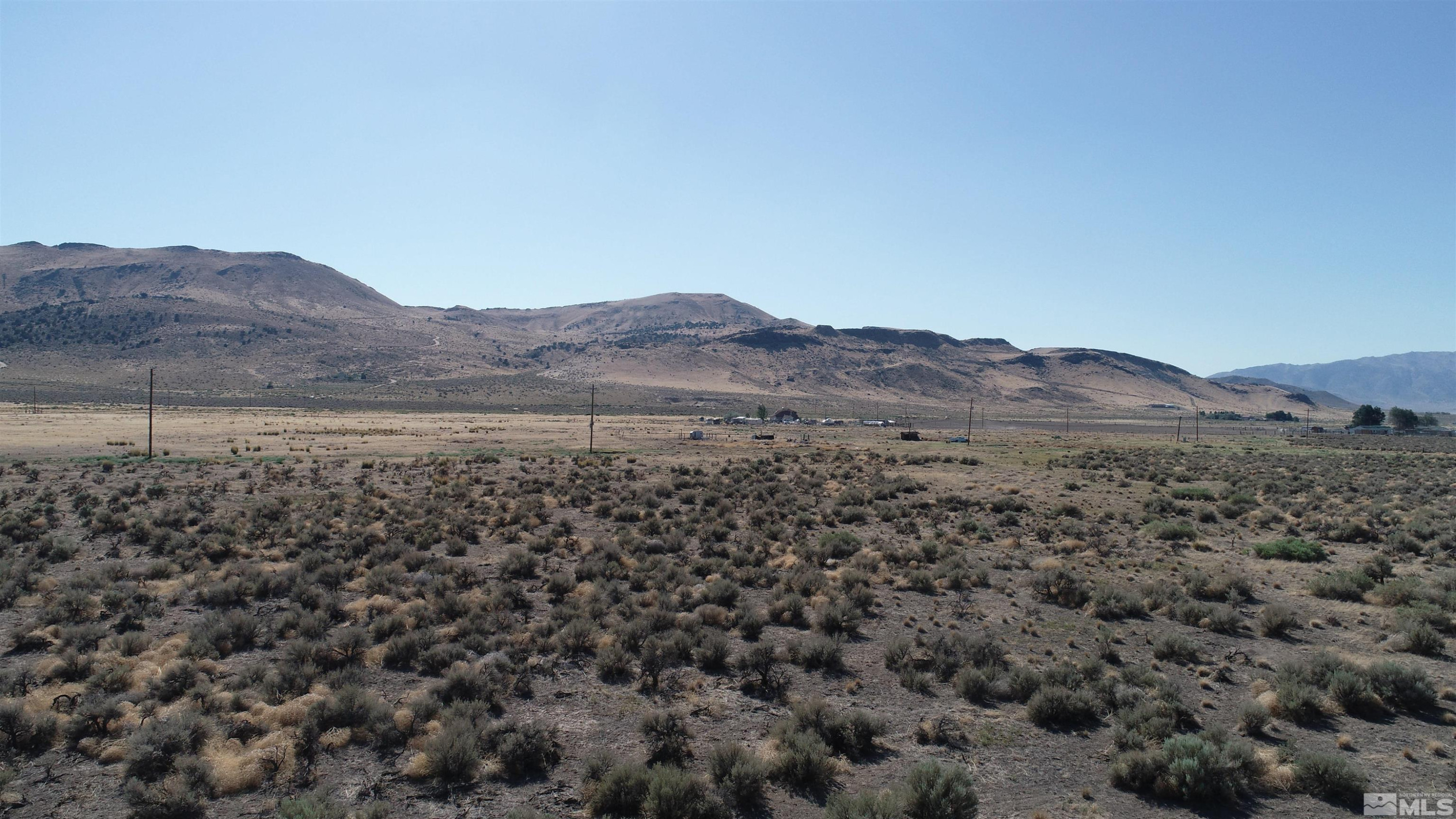 4755 Grass Valley Road Reno, NV 89510 - Photo 3 of 8 a view of a large mountain with a mountain in the background
