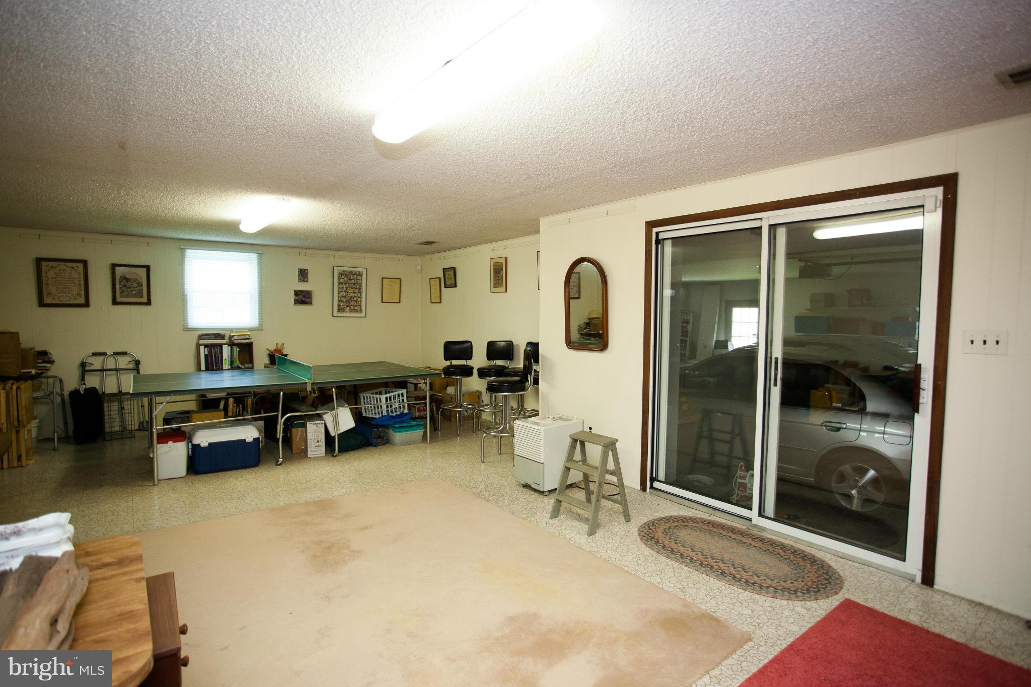 9407 Jodale Road Randallstown, MD 21133 - Photo 20 of 26 a living room with furniture and a window
