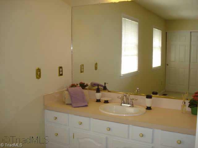 2934 D St Marks Road Southwest Winston-Salem, NC 27103 - Photo 8 of 9 Other. Large Master Bedroom With Ceiling Fan. Long Vanity Has Lots Of Underneath Storage,