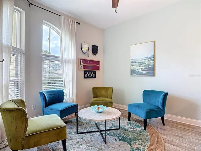 a living room with furniture and a window