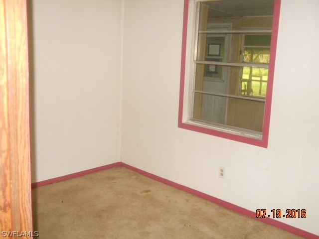 22500 North River Road Alva, FL 33920 - Photo 3 of 6 a small space with a window